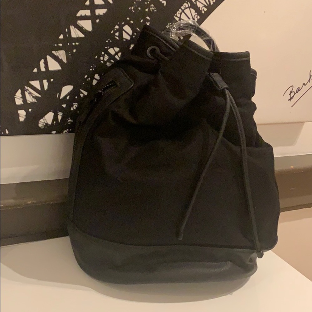 Barney’s canvas and leather drawstring knapsack